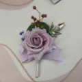 Elegant purple rose wedding boutonniere with berries and gold leaves for groom suit decoration. - Corsage / Purple