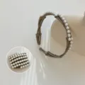 Elegant foldable pearl headband for women with anti-slip teeth, stylish beige hair hoop - Pearl Foldable Headband / Gray