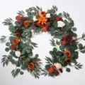 Artificial autumn flower garland with eucalyptus leaves, perfect for party and table decor. - 1.8 ZH007 Orange