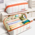 Large capacity canvas pencil case with multi-layer design, waterproof and durable for students. - Off White