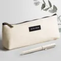 Grosse Kapazitaet Leinwand Federmaeppchen, minimalistischer Dreiecksstil offwhite Etui. - Tanga-Stil / Gebrochenes Weiß