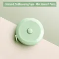 Cinta métrica retráctil mini de 2m verde macaron, regla suave para medidas corporales. - 2 Metros / 1 Pieza / Verde