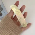 Elegant pearlescent yellow hair barrette with shell texture for half-up hair styles. - Pearlescent Shell Texture Style (221154) / Mermaid Color