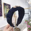 Elegant navy blue braided headband featuring luxurious pearl and rhinestone accents - Navy Blue