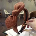 Elegant brown striped fabric bow headband with non-slip interior teeth for women - Khaki