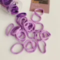 Premium set of soft purple velvet elastic hair ties presented with a clear plastic storage jar - 50 Pcs Bag / Purple