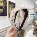 Elegant handmade braided fabric wide headband in soft pale pink color for women - Beige