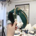 Dark green PU leather knotted headband with stylish gold chain detail for women. - Green