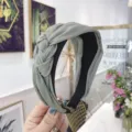 Elegant sage green handmade braided wide headband with a stylish twisted fabric knot - Turquoise Green
