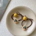 Adorable cartoon face hair ties with yellow beads and bow-knot details in cream color - Cartoon Character Style (2-Pack) / Yellow