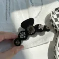 Vintage schwarze Samt-Haarklammer mit eleganten Strass- und Perlenverzierungen für Damen - Runde Kralle Schneeflocke Strass / Schwarz