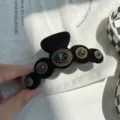 Eleganter Haarklemmer aus schwarzem Samt mit Vintage-Strasssteinen und Goldrand - Runde Kralle Oval Strass / Schwarz