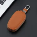 Brown leather car key case with zipper and metal hook, minimalist key organizer pouch. - 9116 Light Brown