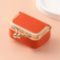Mini orange leather kiss lock jewelry box, compact ring and coin storage pouch variant. - Orange
