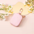 Custodia protettiva AirPods glitter rosa con portachiavi in metallo e zip per uso quotidiano. - Rosa