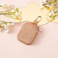Custodia protettiva glitterata per AirPods con gancio dorato, cover per auricolari elegante. - Oro