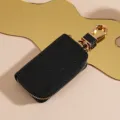 Astuccio per chiavi auto glitterato nero con cerniera dorata e gancio, portachiavi in pelle. - Nero