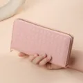 Pink woven long wallet for women, stylish zip-around design with large card capacity. - Woven Pattern Single Zip Bag - Pink