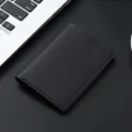 Elegante tarjetero minimalista de cuero negro para hombres y mujeres, diseño compacto. - Negro