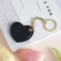 Portachiavi in pelle a cuore nero con catena dorata simpatico ciondolo borsa auto regalo stile - Nero