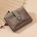 Women's short PU leather wallet with crocodile pattern, card slots and snap button closure. - Khaki