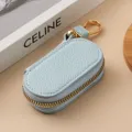 Estuche de llaves de cuero liso con patrón de lichi y cremallera dorada para coche y hogar. - 9121 Azul claro