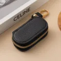 Custodia per chiavi in pelle nera con cerniera dorata, borsetta portachiavi chic. - 9121 Nero