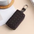 Astuccio portachiavi per auto in pelle intrecciata marrone con zip e gancio metallico. - 9110 Caffè