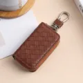 Astuccio per chiavi auto in pelle intrecciata marrone con cerniera e gancio in metallo. - 9110 Marrone