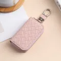Custodia per chiavi auto in pelle intrecciata rosa con cerniera metallica e portachiavi. - 9110 Rosa chiaro