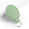Portachiavi ovale in pelle PU verde menta con anello in metallo dorato, minimalista. - Y-04 Verde chiaro