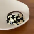 Black and cream checkerboard pattern acrylic knot hair tie with brown elastic band - Checkered