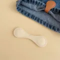 Magnetic no-sew pant hem clips in cream faux leather for adjustable sleeve and leg length - Beige