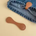Durable brown magnetic leather pant cuff clip for easy sew-free clothing length adjustment - Brown