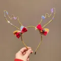 Primer plano de la diadema de astas de reno con LED, lazos rojos y luces brillantes - Diadema de Cuernos de Reno Grandes con Luz (5#) / Tamaño aprox. 11cm / Dorado
