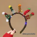 Detail view of a glowing Christmas headband with festive pom-poms and decorations - Christmas Gift Box - [Luminous] (16#) / approx. 12.5cm