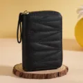 Tarjetero de acordeón acolchado negro con cremallera, pequeño monedero compacto. - Negro