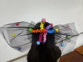 Halloween black mesh bow headpiece with colorful pom-poms for cosplay decoration. - Pom Pom Twist Clip (02) / Colorful