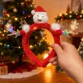Detalle de diadema navideña luminosa con Papá Noel de peluche y hermosas astas de reno - Diadema de Navidad - Copo de Nieve Muñeco de Nieve (17#) / 1 Pieza