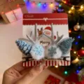 Pinzas navideñas festivas con astas plateadas y detalles de pompones de copos azules - 2 Piezas/Juego / Asta Plateada Piña Azul