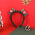 Festive plush green Christmas headband featuring red snowflake pom-poms and green leaves - Knit Christmas Candy (11#)