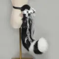 Faux fur black and white animal tail cosplay accessory with elegant bows and chains. - Beast Tail / Black and White