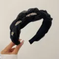 Elegante zwarte gevlochten haarband met parels en kristallen accenten voor dames. - Zwart