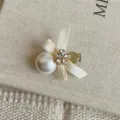 Barrette à cheveux élégante avec nœud crème, perle et fleur en cristal étincelant - Pince Nœud Blanc Perle Artificielle / Blanc
