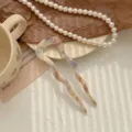 Forcina per capelli a U in acetato con motivo marmo rosa essiccato per chignon - Stile a U Ondulato / Aurora boreale
