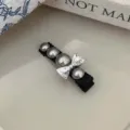 Elegant hair clip with grey pearls and clear rhinestone bow detail on black base - Gunmetal Pearl Bowknot