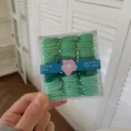Premium set of assorted green shades small hair ties in a clear storage box for girls - 90 Pieces Set / Forest Green