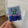 Pack of mini candy colored hair elastics for kids in blue and purple gradient shades - 90 Pieces Set / Dream Blue