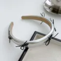 Elegant silver faux leather headband featuring delicate black ribbon bows for women - Black Thread Bow Headband / Silver