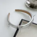 Silver faux leather padded headband with delicate bow accents for women - Bow High Top Headband / Silver